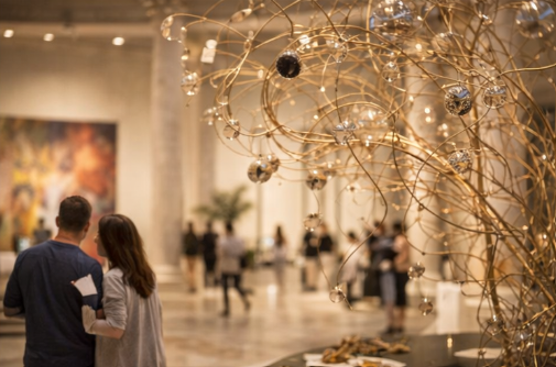 A family enjoying an interactive exhibition together at MonoMuse museum.